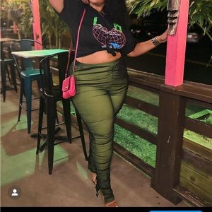 Lime green pants. With black sheer over top